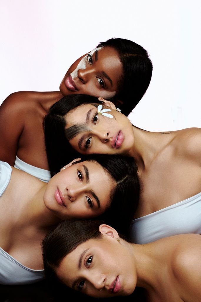Artistic portrait of four diverse adult women showcasing beauty and solidarity.